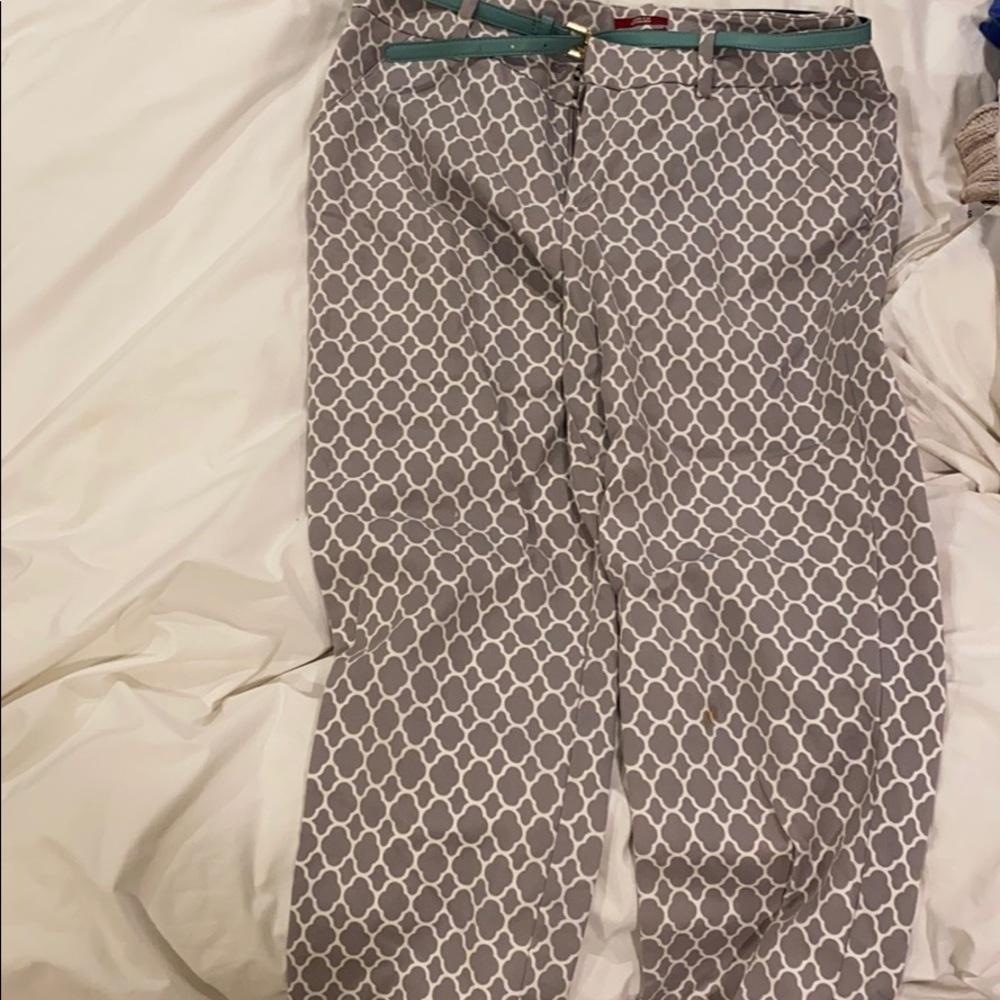 Gray pants with a blue /teal belt